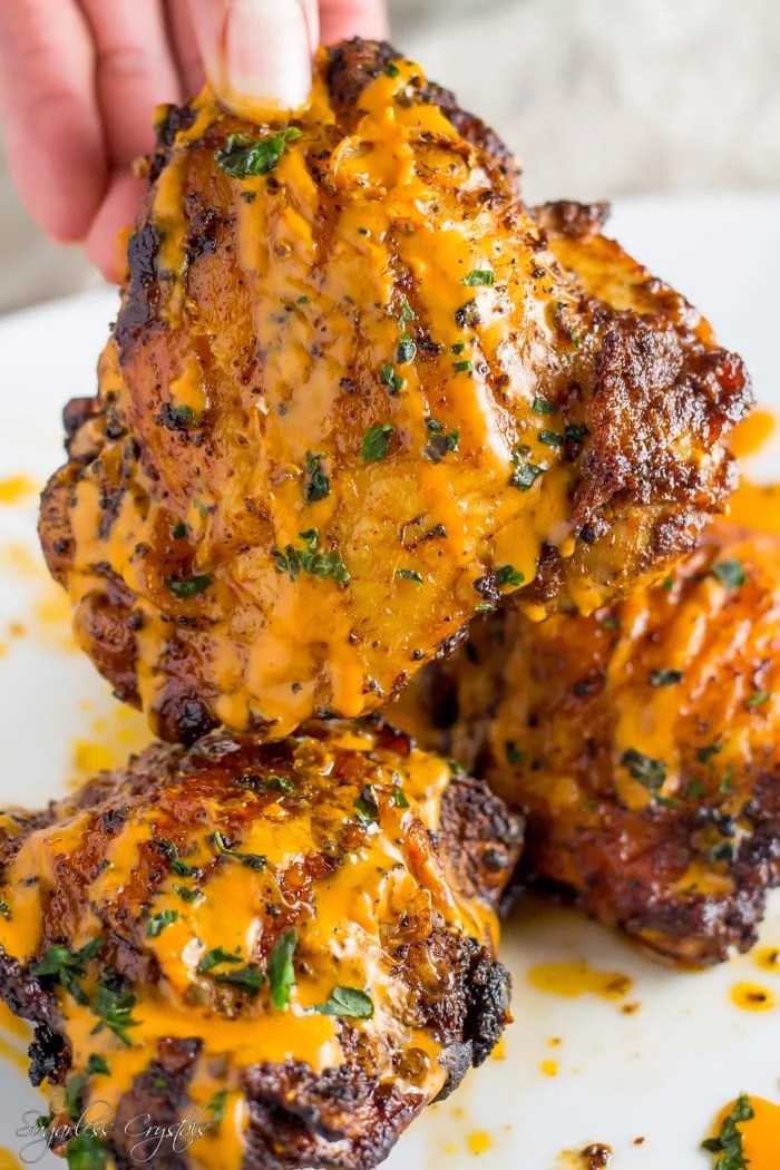 Spice Rubbed Buffalo Chicken Thighs Drizzled In Sauce
