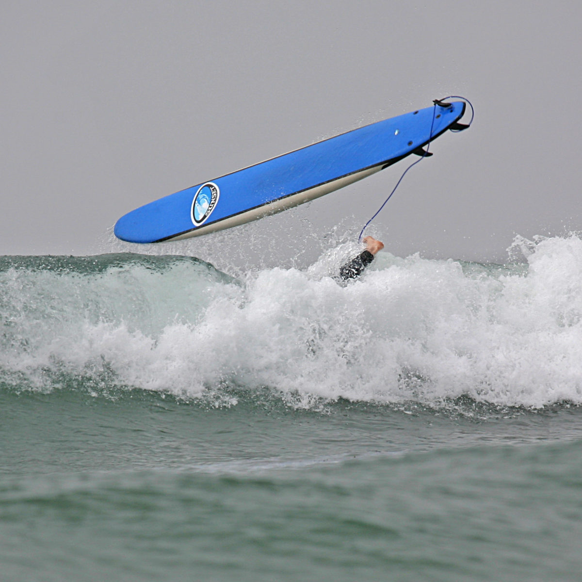 Learning to Surf in Tamarindo Suitcase and Heels