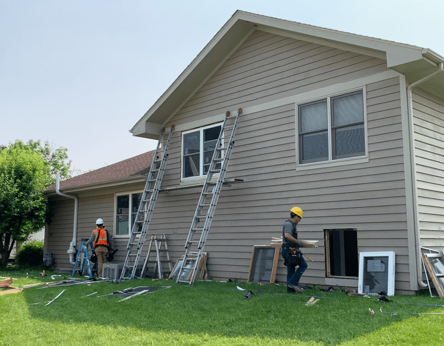 contractors at work Sunshine Siding & Window Co