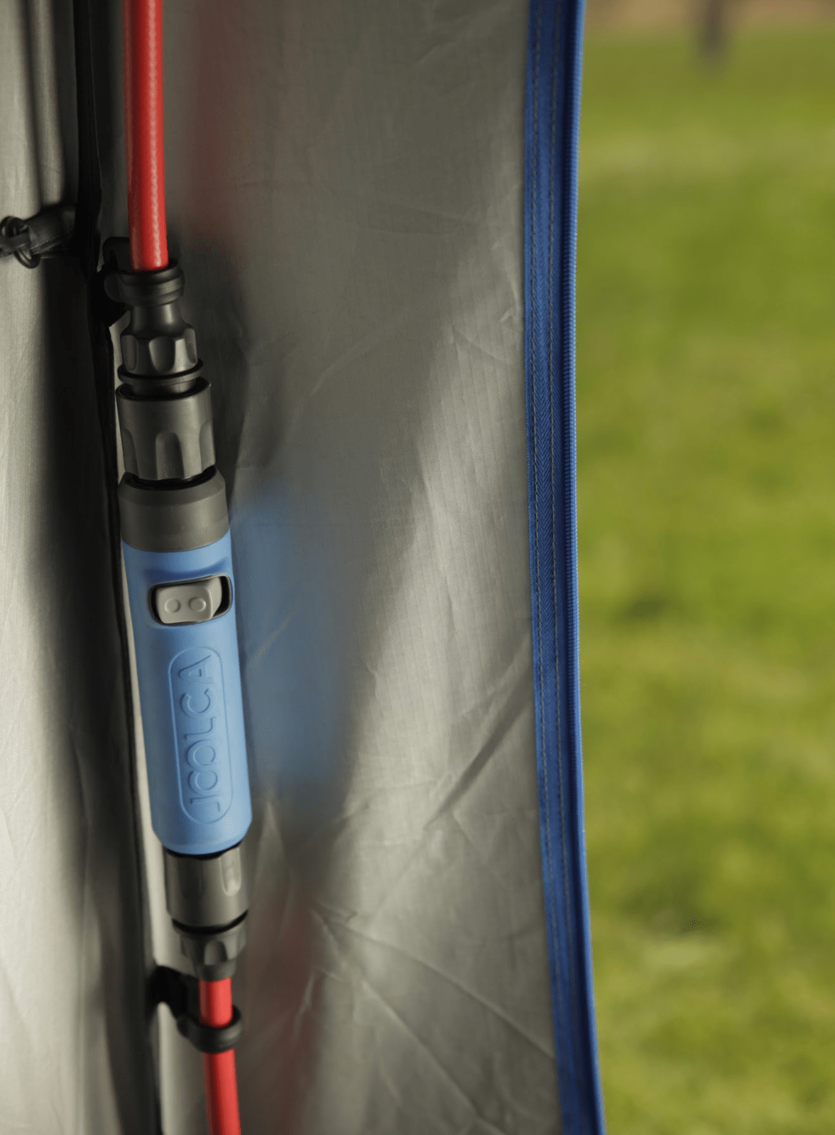 How does the shower head and holder integrate with the ENSUITE Tent