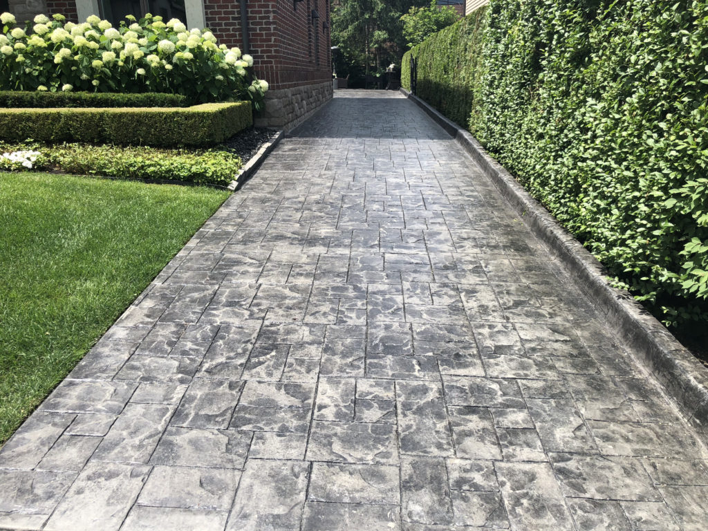 Benefits of Stamped Colored Concrete Pressure Washing & Sealing in