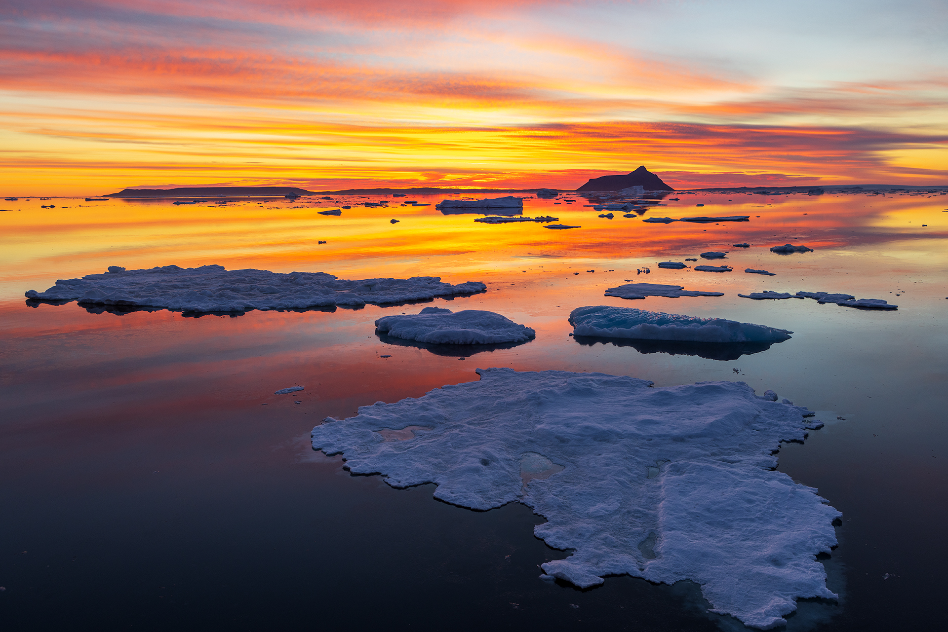 Sea Ice at Sunrise with Cockburn Island in the Distance, Weddell Sea