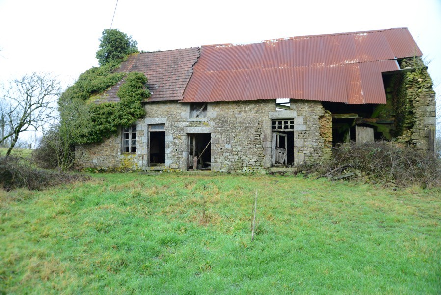 Detached stone house to renovate in Normandy with half an acre