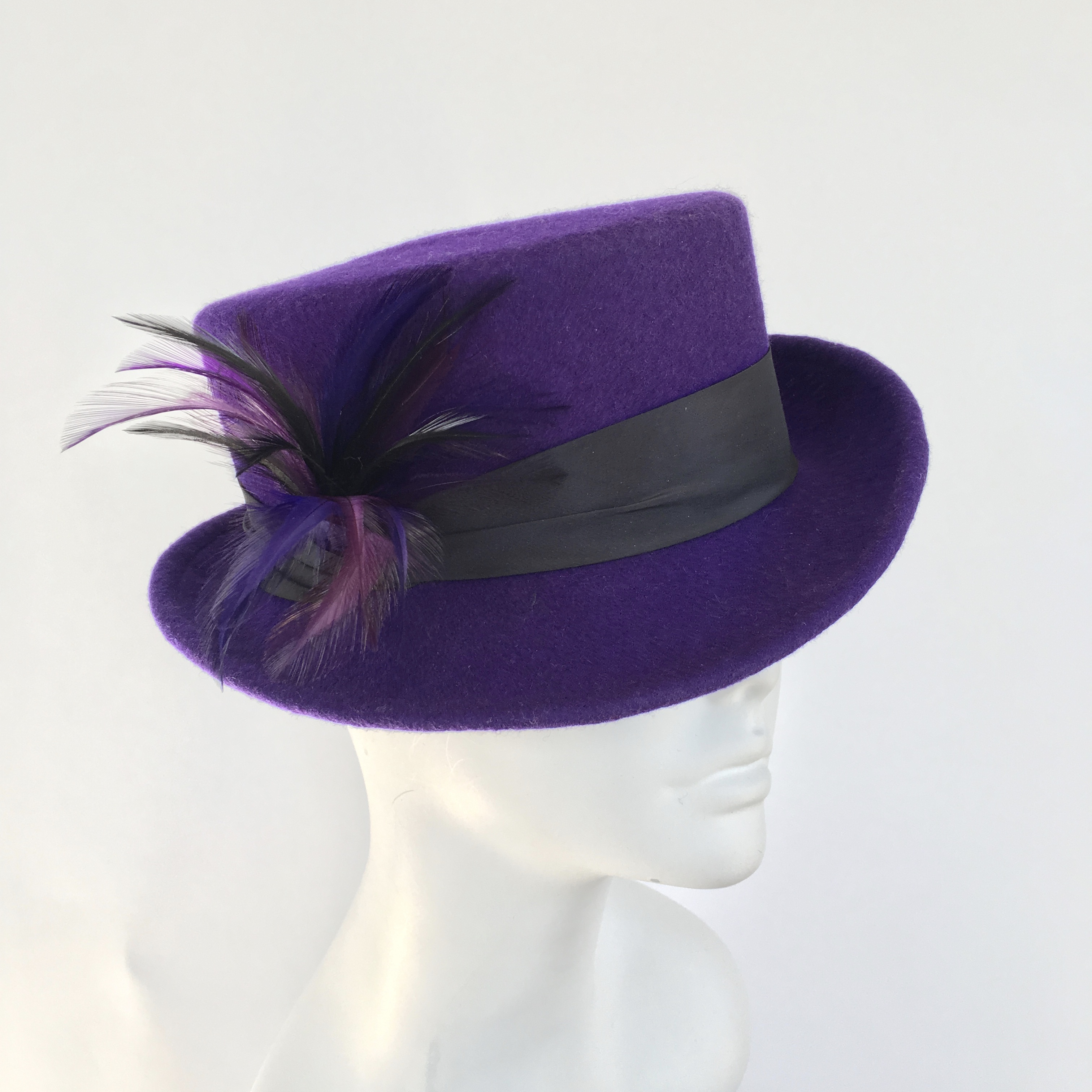Purple wool hat, top hat with feathers, women’s fedora