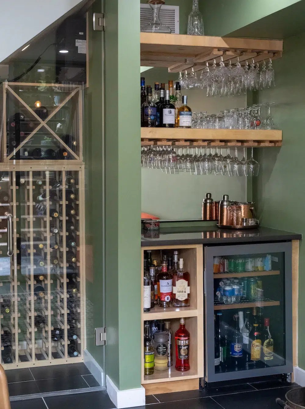A Basement Remodel in DC Unveils Wine Storage Under the Stairs