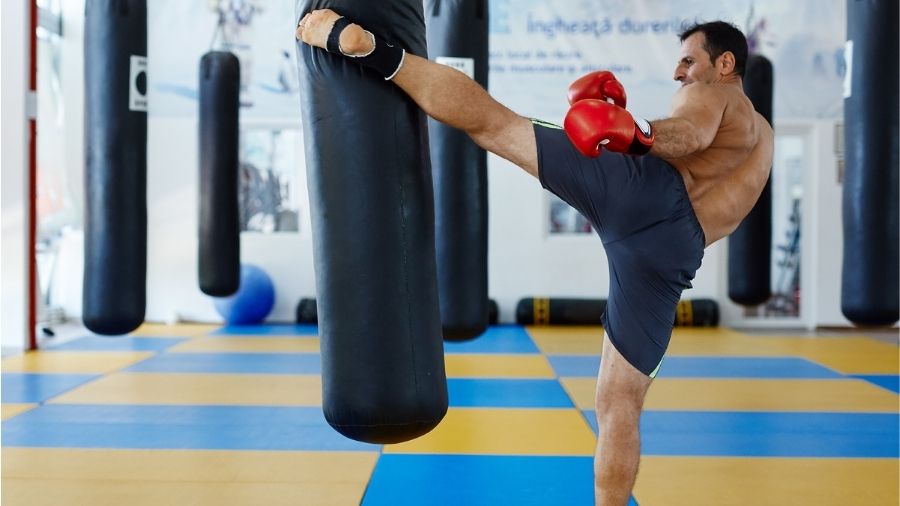 Does Kickboxing Build Muscle? Sweet Science of Fighting