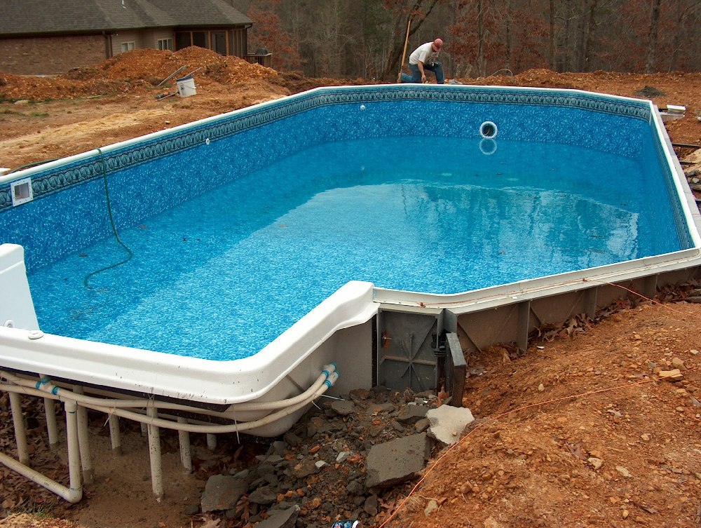 How much water evaporates from a pool each day? Swimming Pool