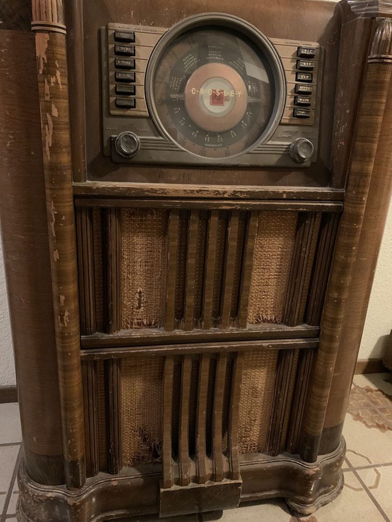 Marwan admires his cousin’s Crosley receiver/phonograph console The