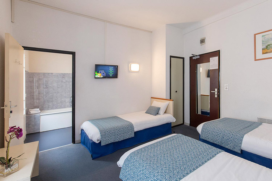 Rooms of Hotel in Lourdes. Official site.