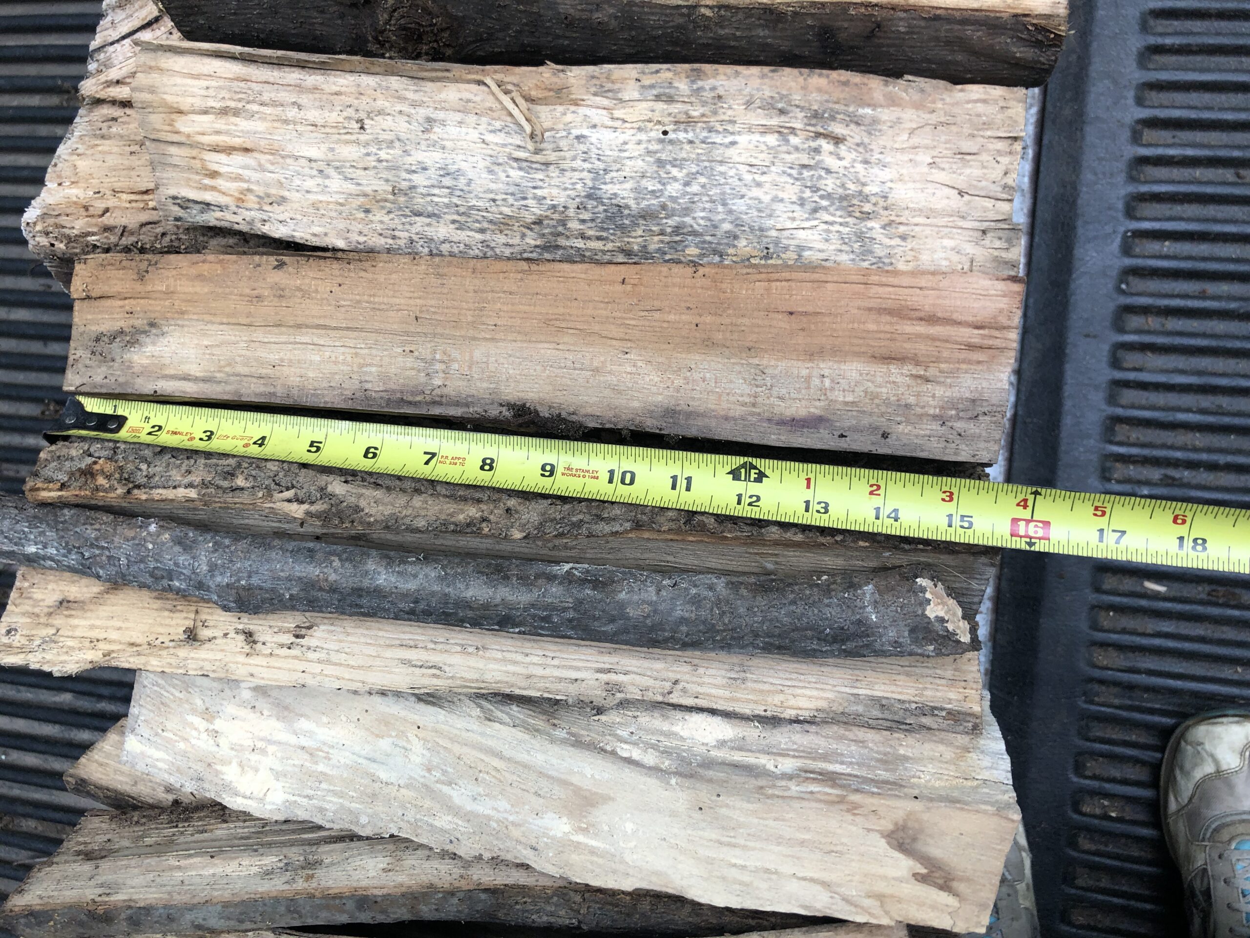 Single Row of seasoned hardwood campfire wood on truckbed delivered