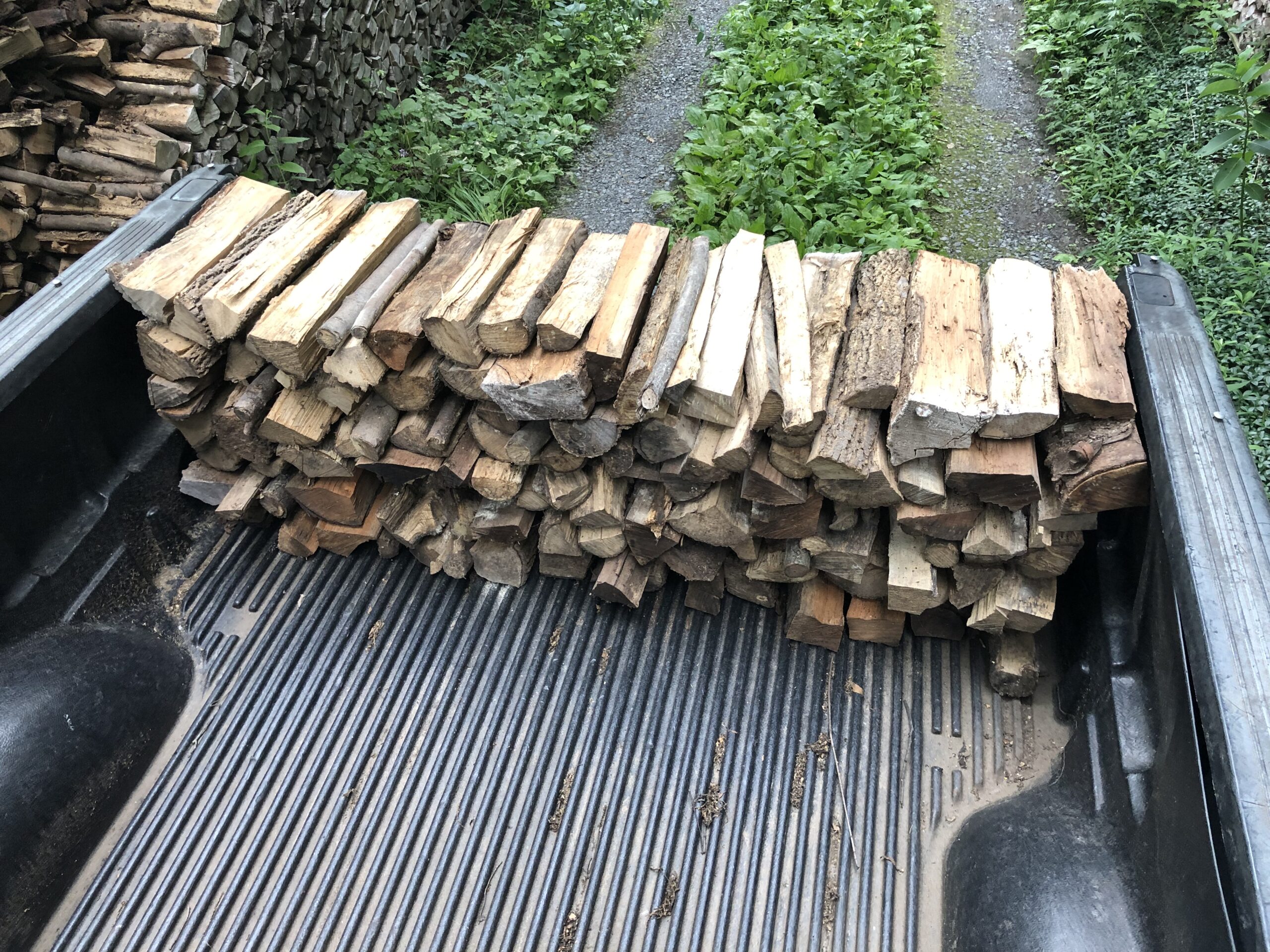 Single Row of seasoned hardwood firewood on truckbed delivered