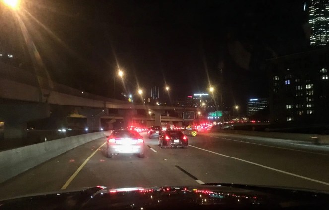 Traffic jam during evening commute on highway. Learn how to commute on back roads to avoid this kind of delay!