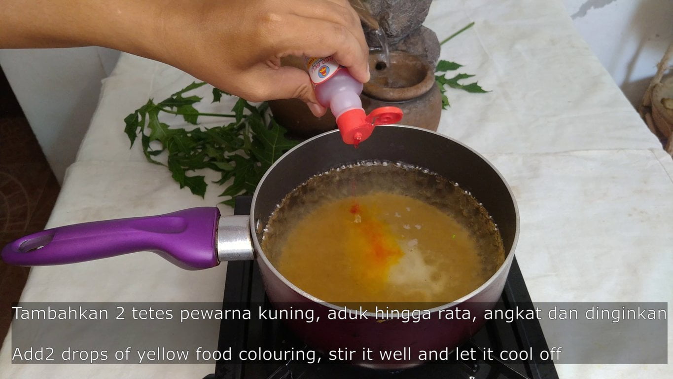 adding food color to the solution
