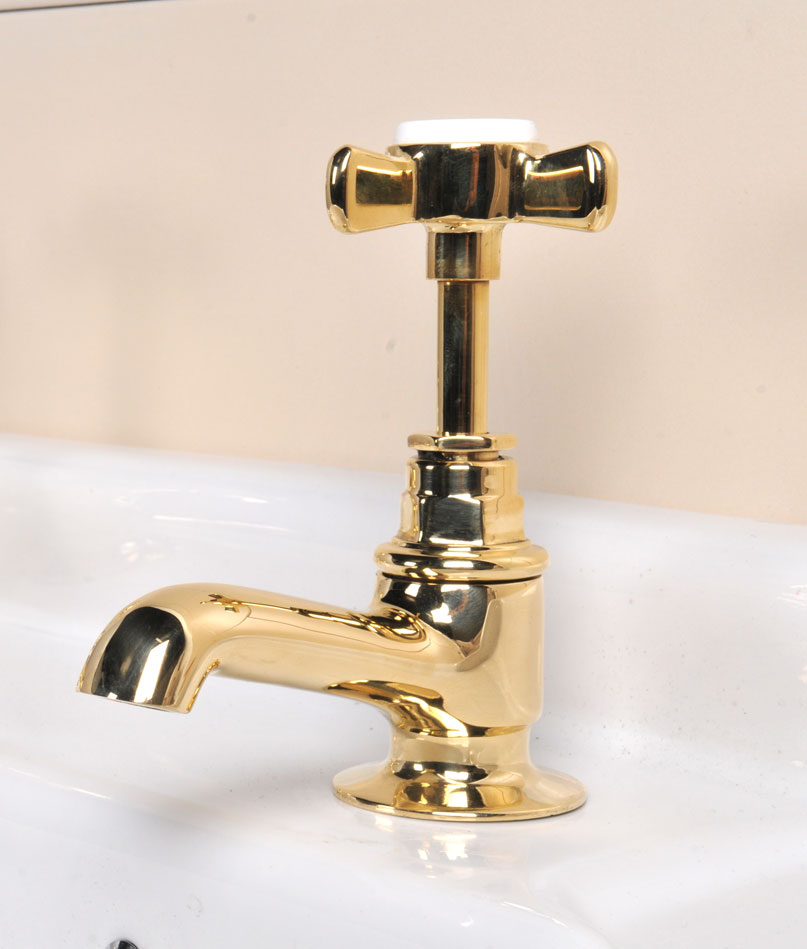 Polished brass basin taps (restored)