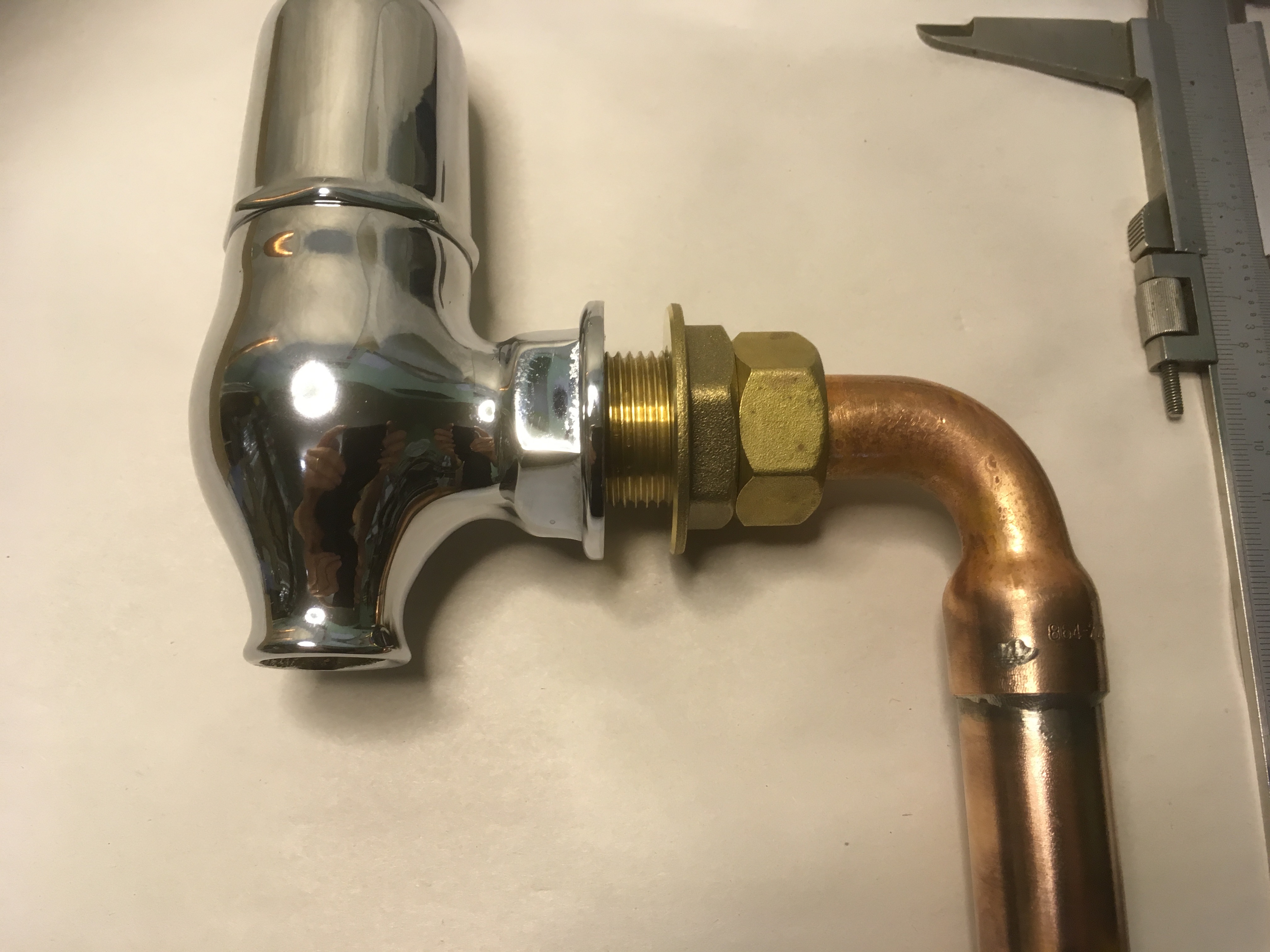 Globe taps in polished brass.