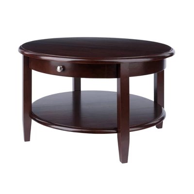 Those with drawers that curve around are a classic choice, but it's also possible to find an oval coffee table with a lift top or a shelf below. Concord Round Coffee Table With Drawer And Shelf Antique Walnut Winsome Target