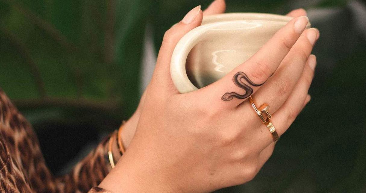 40 Tiny Finger Tattoos That Define Perfection TattooBlend