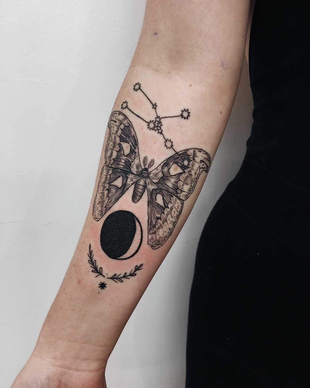 Moon and butterfly tattoos