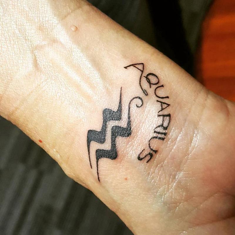 Forbidden Images Tattoo Art Studio : Tattoos : Misc : Aquarius Wrist Tattoo 800_x_800_jpg