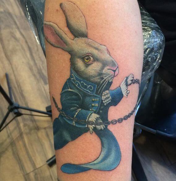 50+ Alice In Wonderland Tattoos Ideas & Designs (2022) 585_x_569_jpg