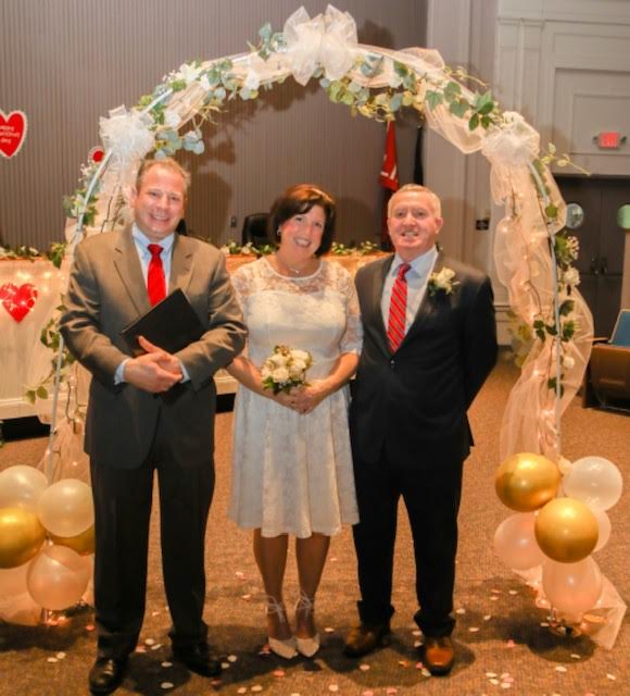 Huntington Town Clerk Andrew Raia performs eight marriage ceremonies