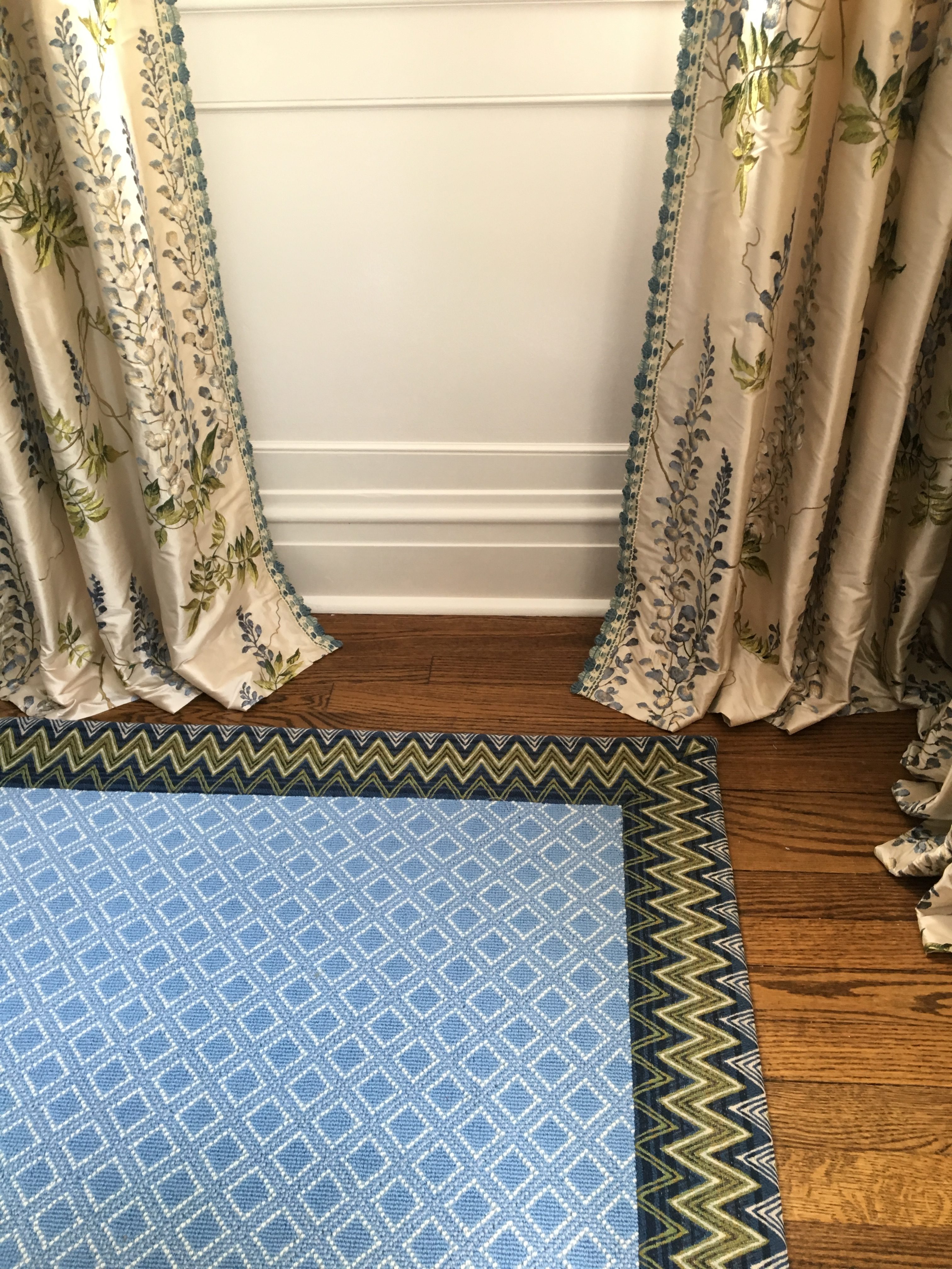 Rug ideas for large rooms on a budget and tips for sizing a rug.