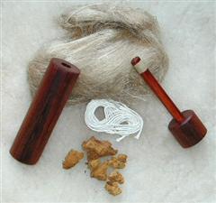 Fire piston, photo from http://www.survivalschool.com/products/fire_starting/Fire_Pistons.htm