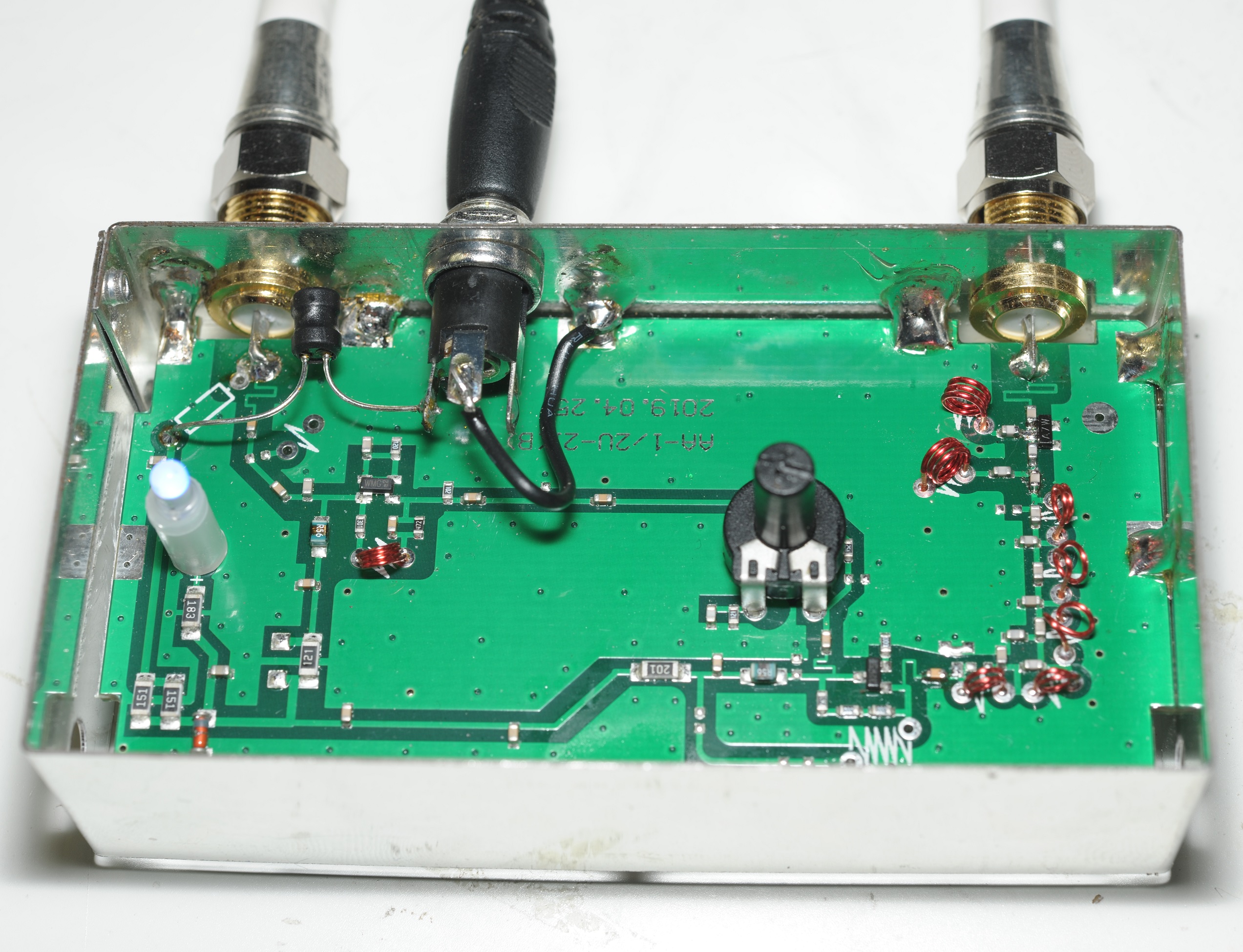 Adding a DC input to a UHF masthead amplifier (and reverse engineering