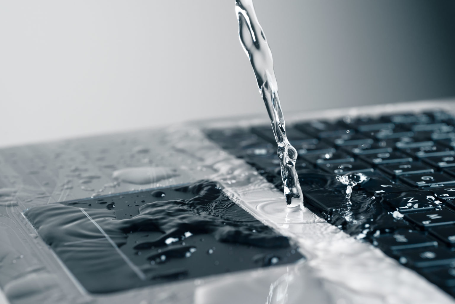 Spilled Liquid on Laptop Touchpad What to Do? Tech With Tech