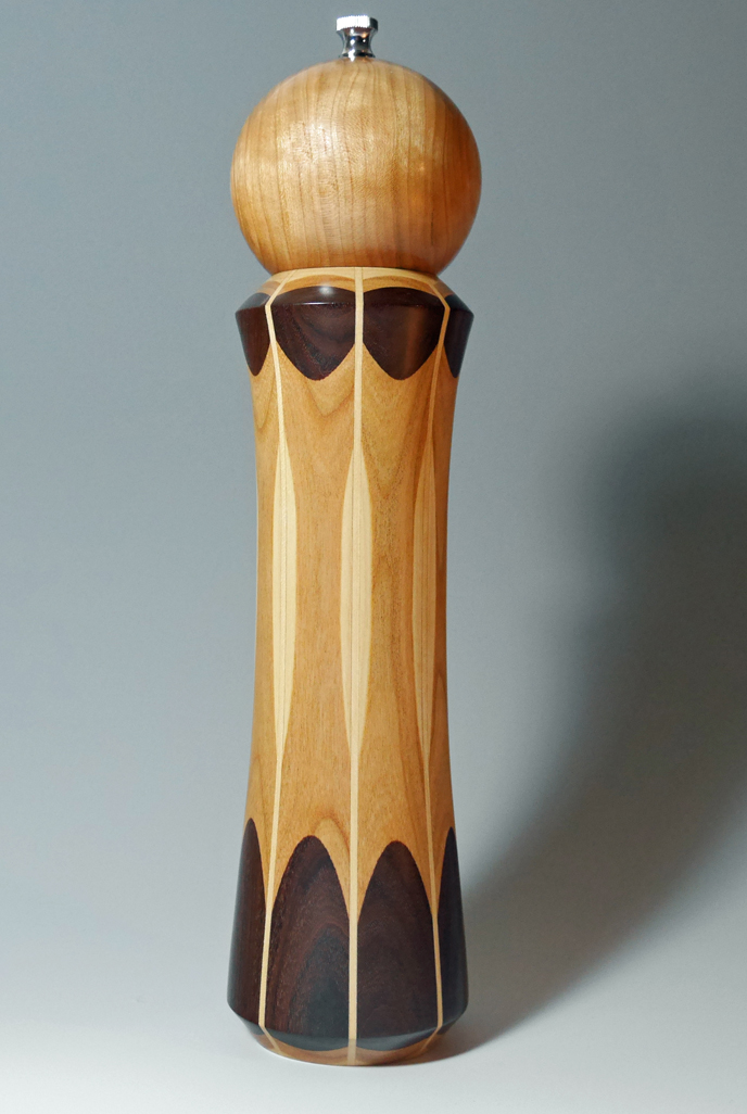 Segmented stave pepper mills turned from cherry, walnut, maple, and