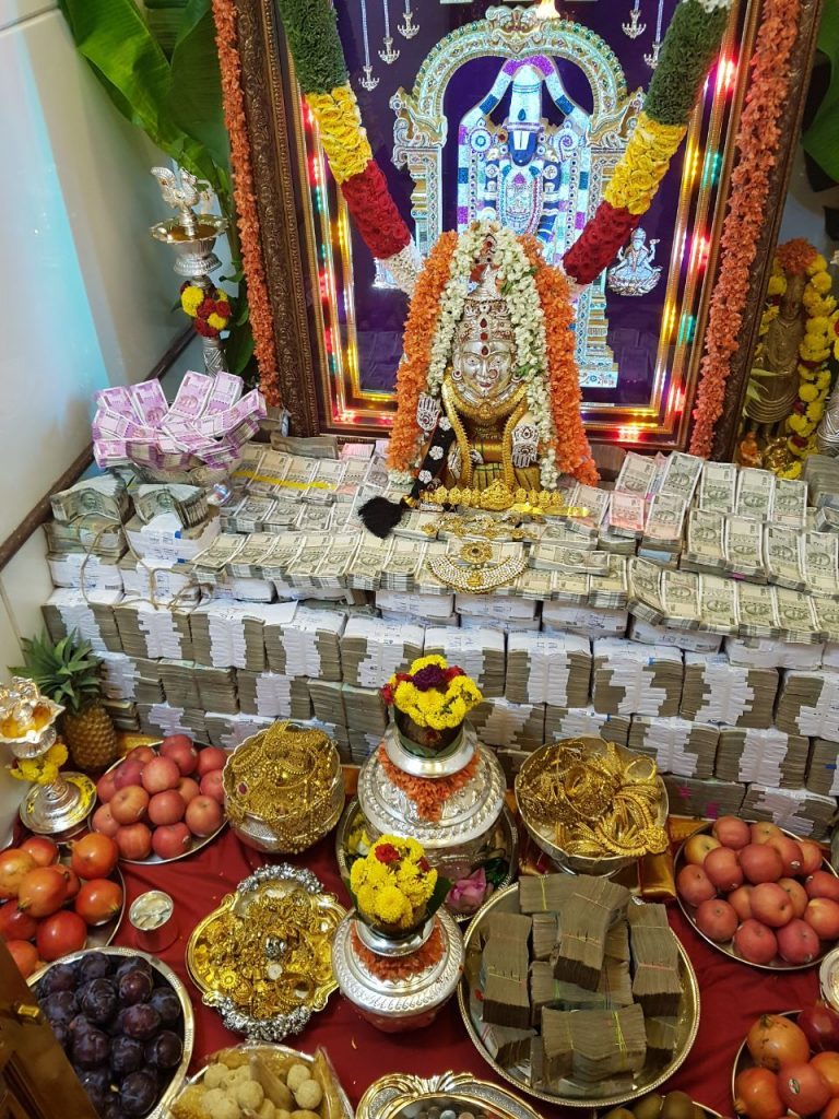 Karnataka minister devotion Varalakshmi vratham Money