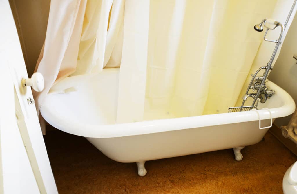 Shower Curtain Turning Orange? Top 4 Causes (+ How to Fix)
