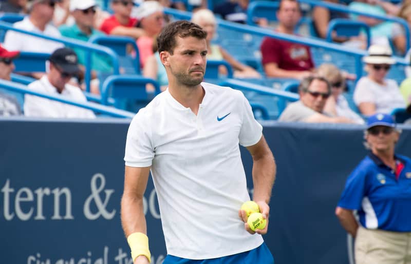 How Tennis Players Choose Balls Before Serving (Explained)