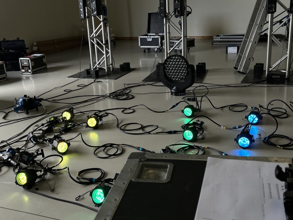 Stage lighting being tested before being put on stage 