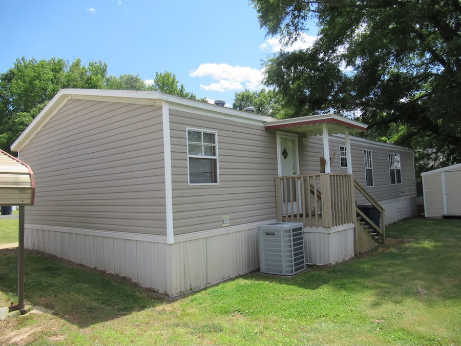 Doublewide Mobile Home (to be moved), Carport, Storage Building