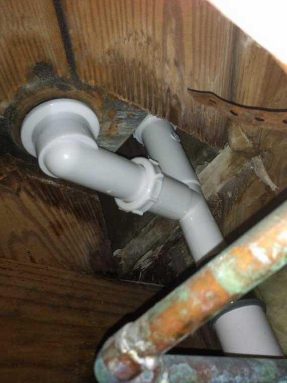 A WTF plastic fitting on old cast iron. Tub drain Terry Love Plumbing