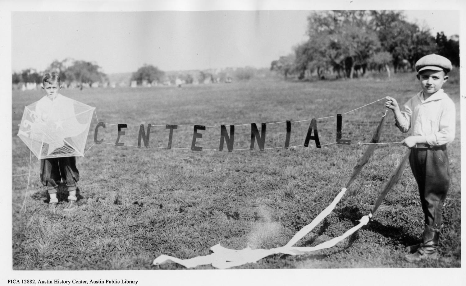 [Boys Holding Centennial Kite] The Portal to Texas History