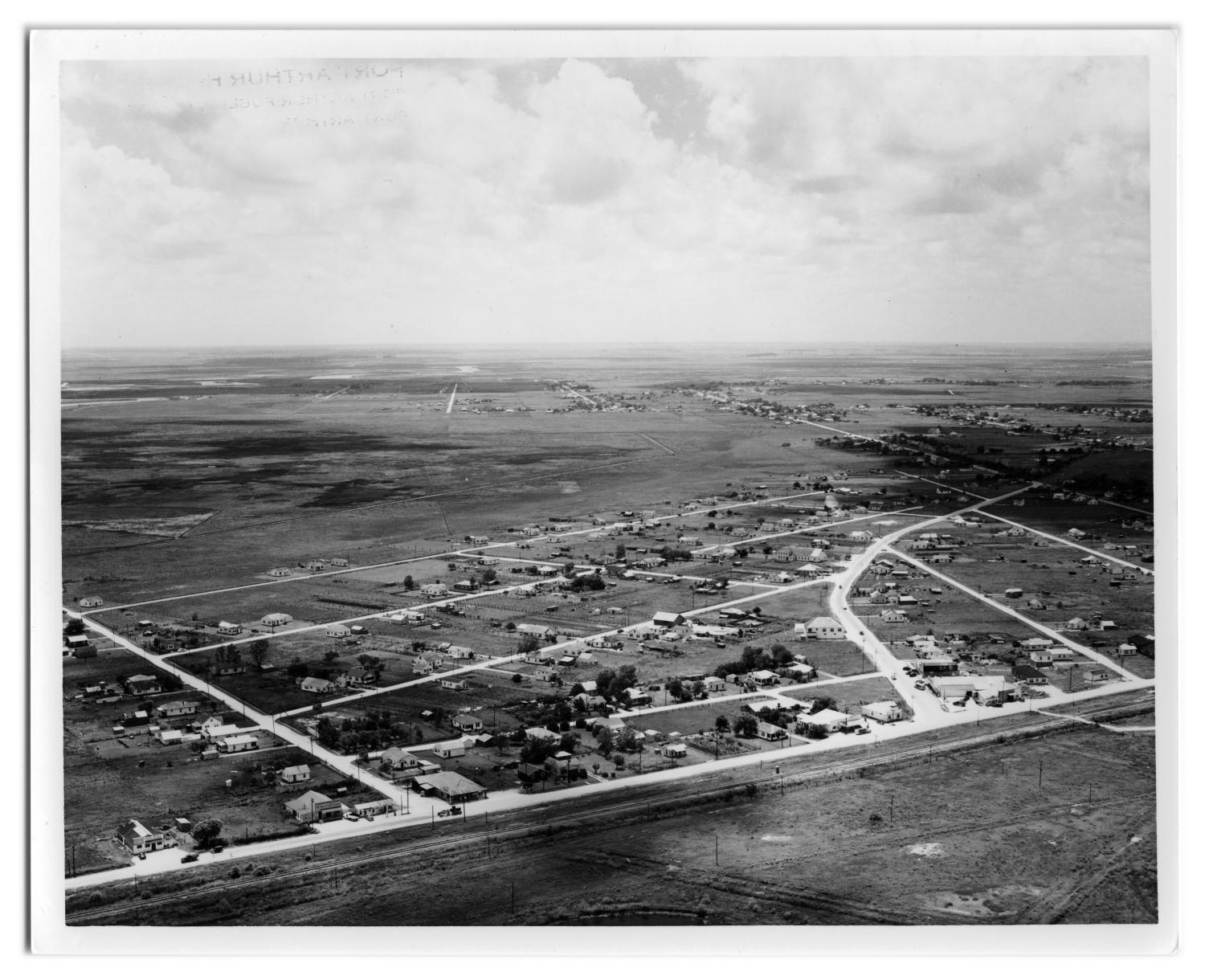 [Aerial of Port Acres Community] The Portal to Texas History
