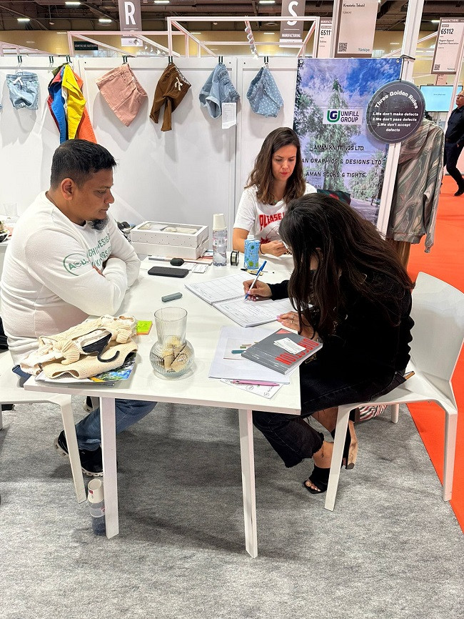 Aman Graphics and Designs Ltd. showcasing their products at Premiere