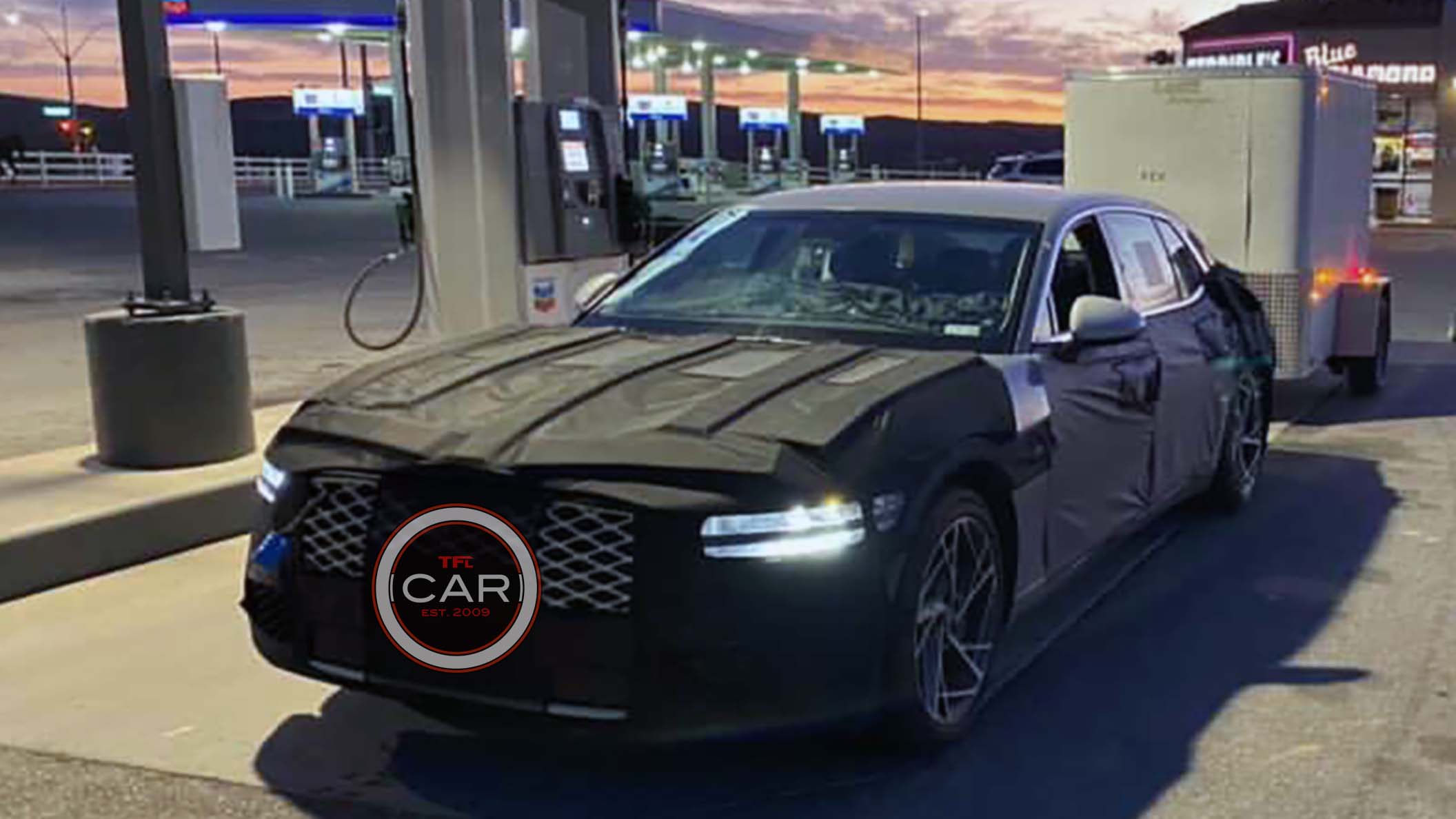 Genesis Detroit Auto Show 2023 Hmm, Why Is This Genesis G90 Towing A Trailer? - The Fast Lane Car