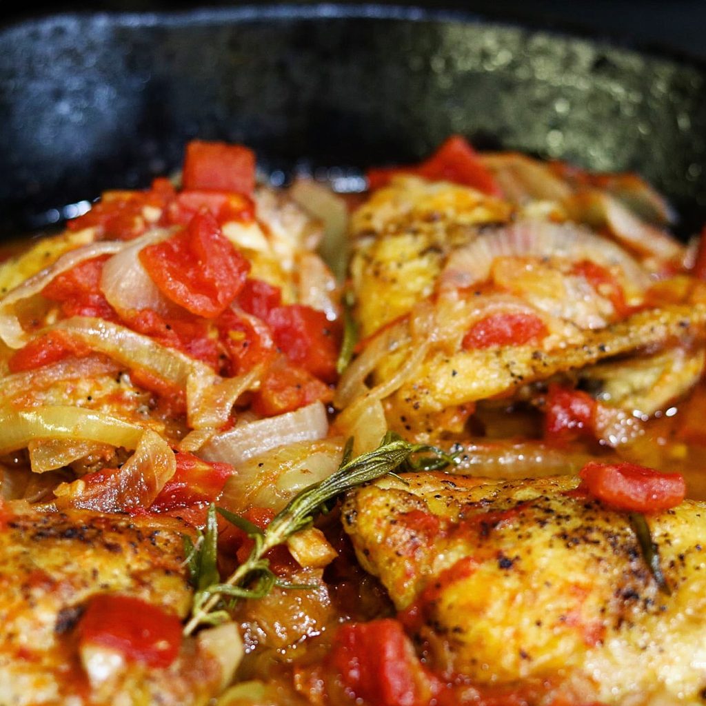 Simple, Delicious Chicken Thighs Braised with Tomatoes, Onions, and