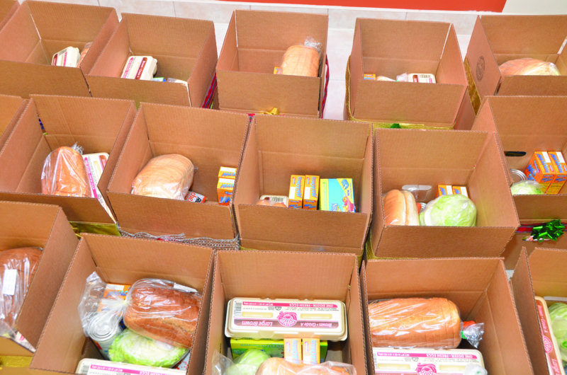 LIME/ATB DISTRIBUTE GIFTS, FOOD BASKETS The Anguillian Newspaper