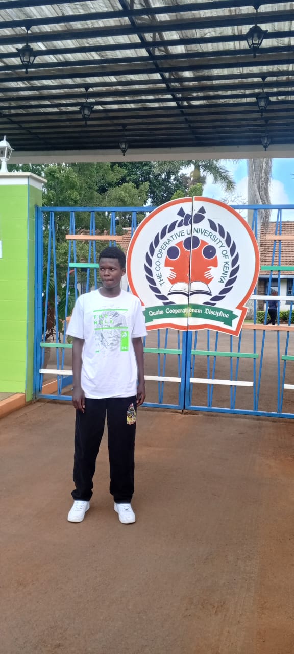 Clinton Kamau a beneficiary of Education program