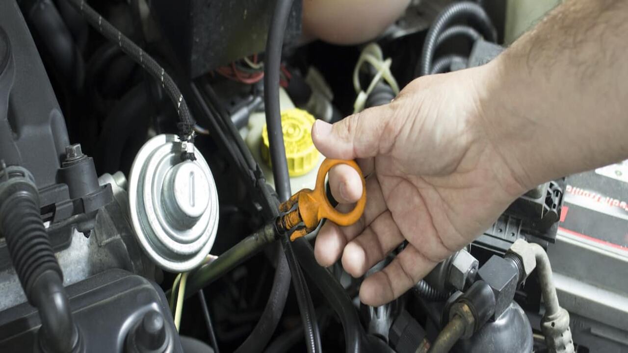 Locating The Engine Oil Dipstick