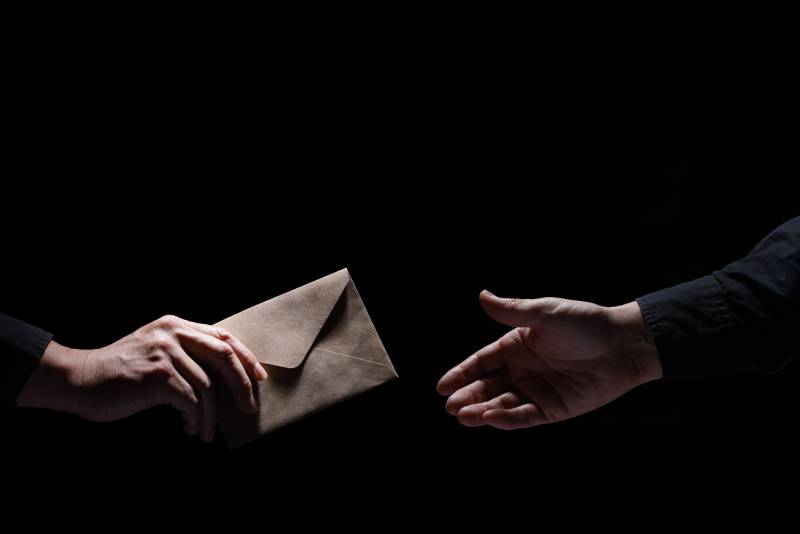 What Does "Receive A Kickback" Mean? When To Use This Idiom