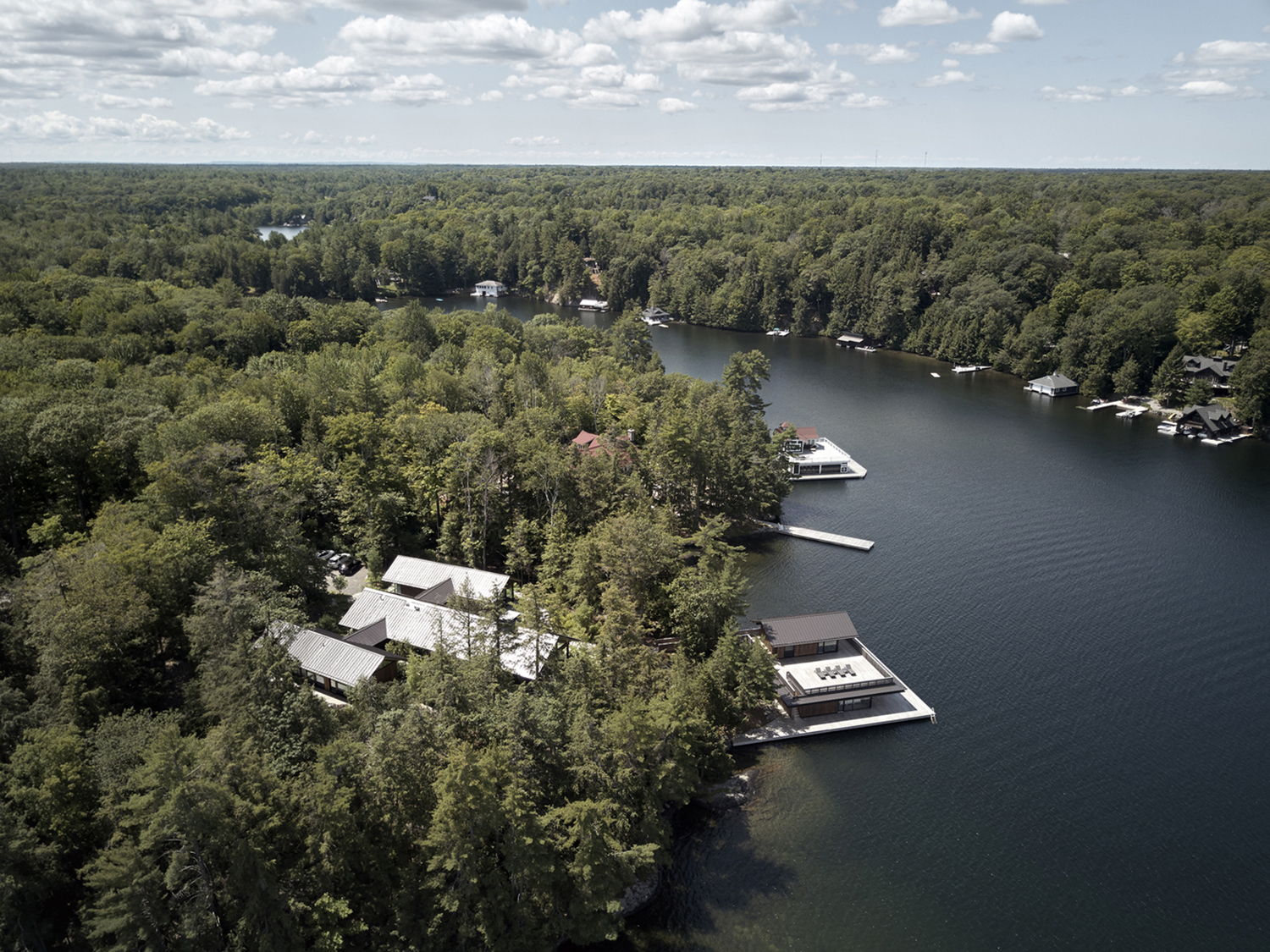 Sublime Vision and Execution In This Cottage Boathouse, Lake Joseph