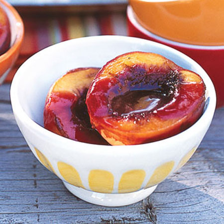 epicurious...Grilled Peaches with Fresh Raspberry Sauce