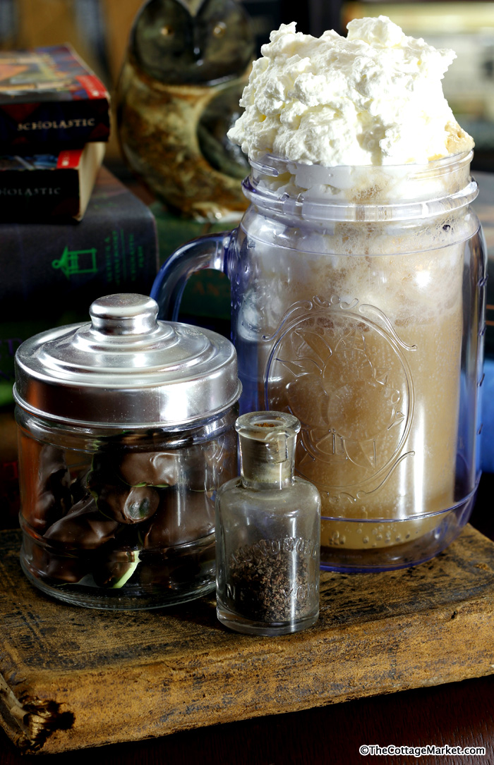 Creamy, sweet butterbeer topped with vanilla ice cream and whipped cream