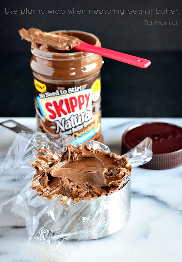 Kitchen Tip: Use plastic wrap to line measuring cup, fill with peanut butter, then lift the plastic out and scrape/pour it off into bowl. TidyMom.net