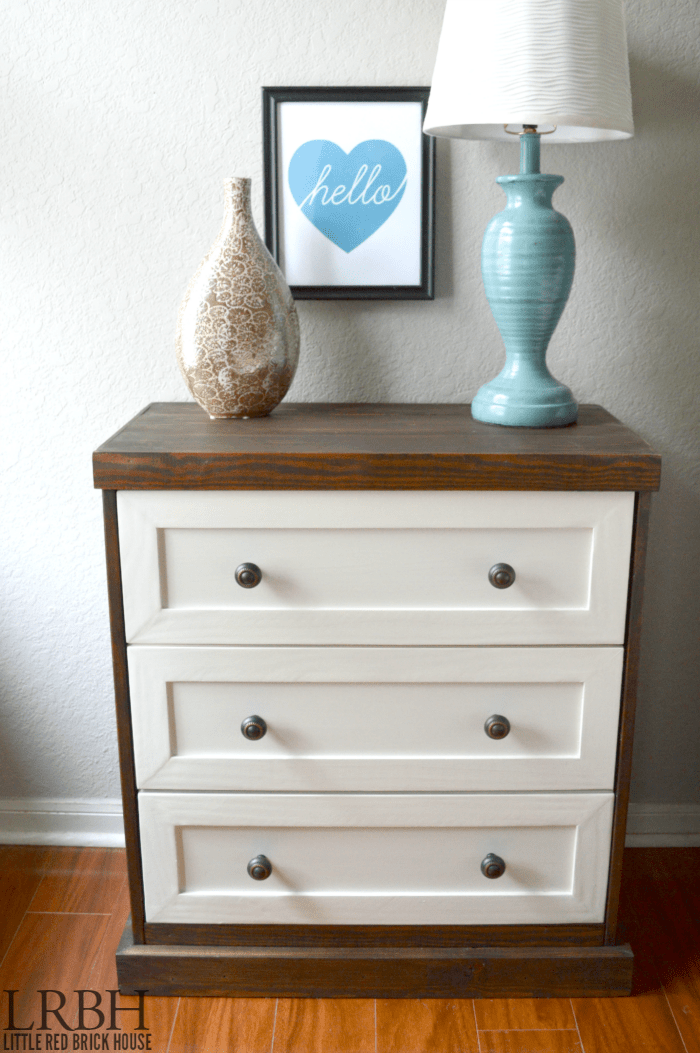 The combination of stained wood and white on this nightstand is beautiful.
